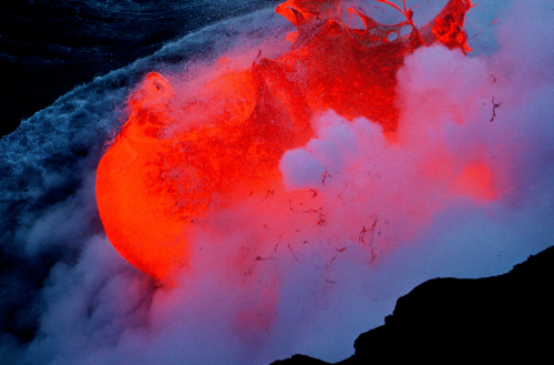 20aliens:Lava flows from tube into sea near Kupapau Point, Kilauea and explodes upon contact with se