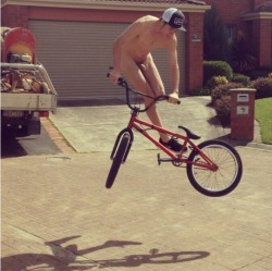 fun2bnaked:  An impressive bike trick is much better done naked, right in the neighborhood!  f2bn