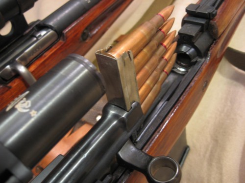 45-9mm-5-56mm:  gunrunnerhell:  Scoped A very nice comparison view of two classic Russian sniper rifles; the Mosin Nagant 91/30 PU and SVT-40. You’ll notice right away that because of how the SVT’s scope mount is installed and where it’s located,