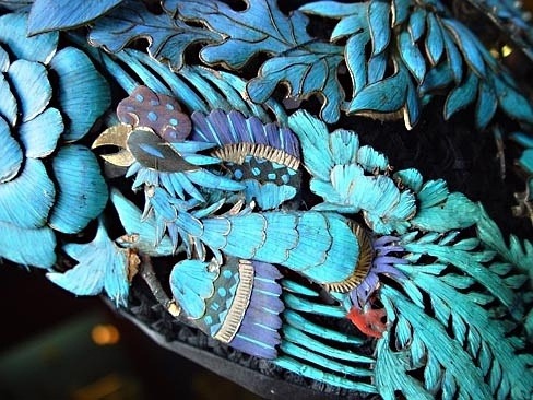 For 2,000 years, the Chinese have been using the iridescent blue feathers of kingfisher birds as an 