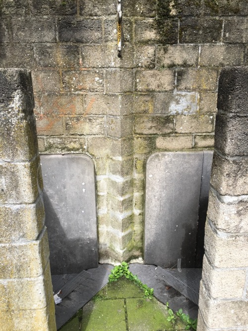 worldofurinals:  A real old fashioned public urinal at the park in gent.  2/3 hidden away in the bushes with a single light, so smelly 😖