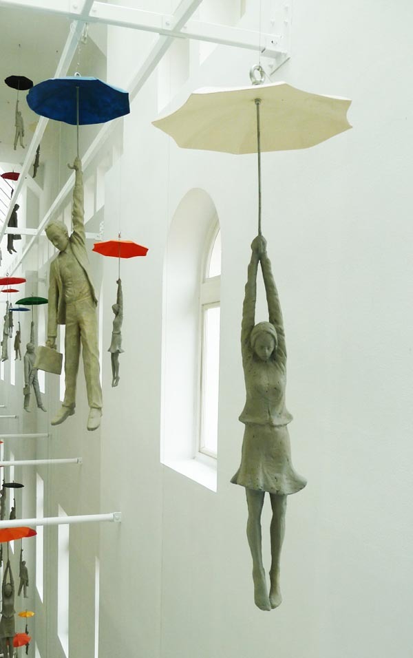 weandthecolor:
“ Slight Uncertainty An installation of cement figures dangling from umbrellas inside the EBC office center in Prague by Czech artist Michal Trpák.
More images of the art installation on WE AND THE COLOR
Facebook // Twitter // Google+...