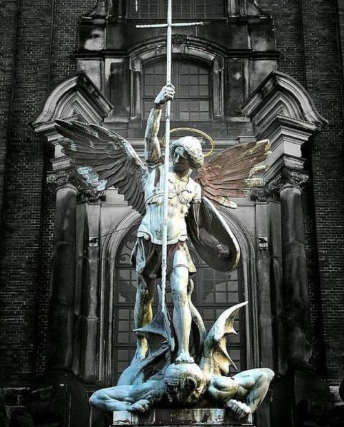 victorianink:Archangel Michael’s victory over the Devil, sculpture found above the main entrance at 