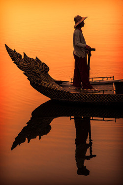 0mnis-e:  Cambodian Boatman, By R. Andersen.