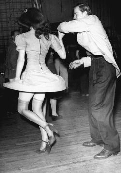 vintagegal:  An aircraft worker dancing with