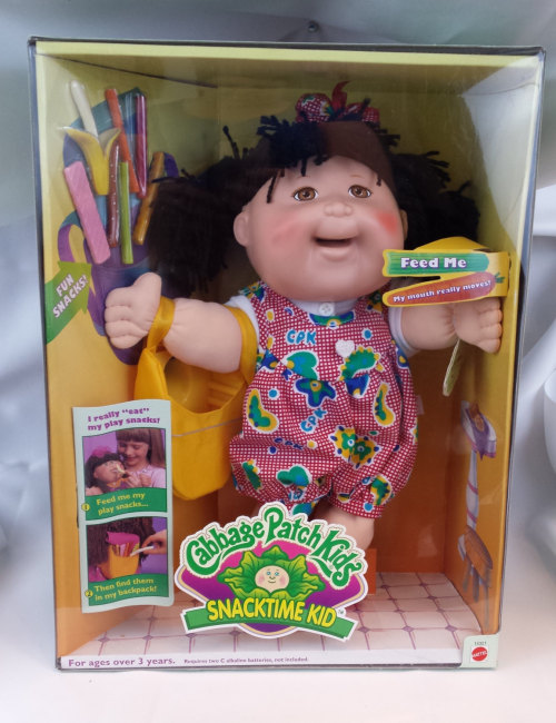 destructiontheory:This is a Cabbage Patch Kids Snacktime Kids doll from 1996. The eating doll with a