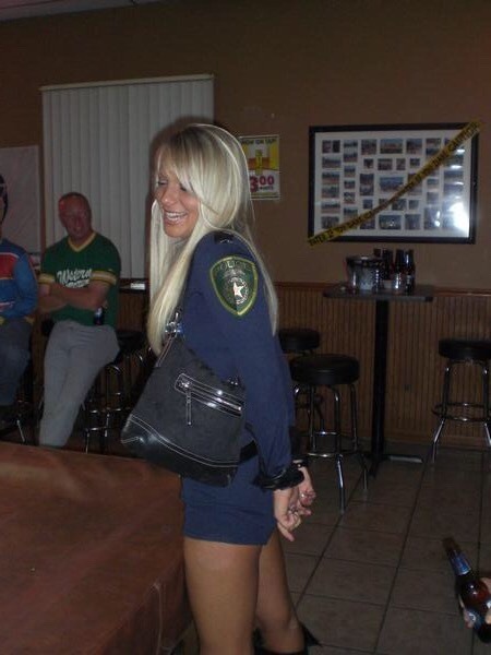 Blonde cutie in cuffs