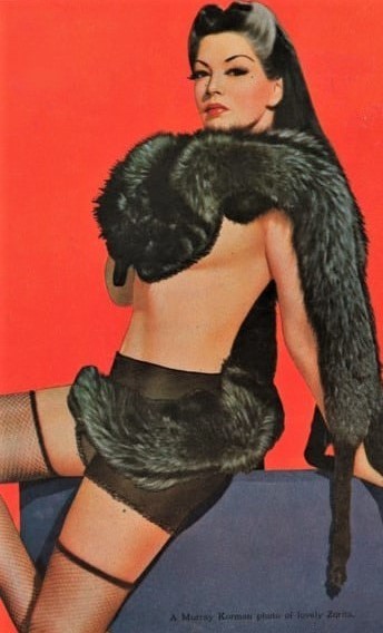  Zorita was a 1940s burlesque dancer known for performing spectacular acts with her two pet boa cons