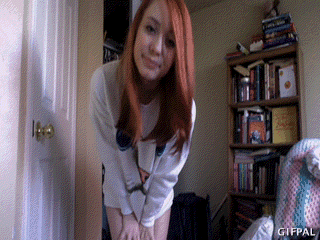 sexysexnsuch: queen-cumslut:Super awkward gif in my cute new kitty sweater!We should be friends. -J