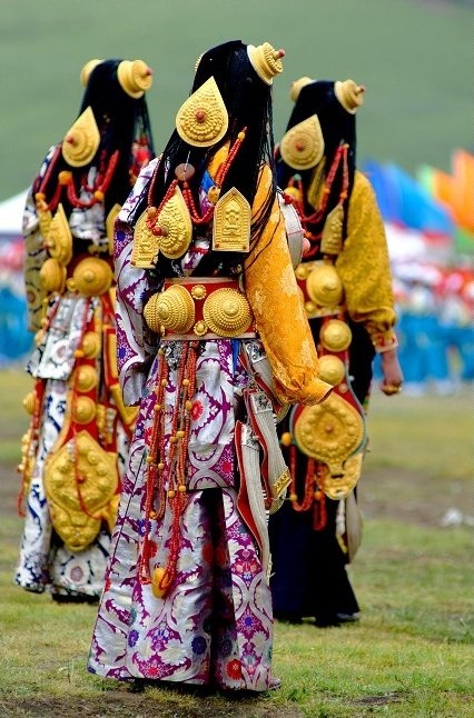 Some of Litang&rsquo;s most opulent ceremonial costumes. Metal - i.e. silver or gold - is very i