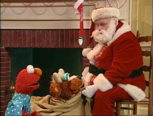 Elmo Saves Christmas (1996) - Charles Durning as Santa ClausThe beard looks way too fake here, but i