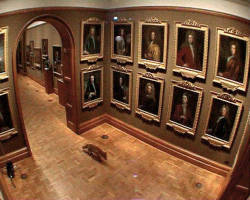 Francis Alÿs, Nightwatch, 2004.   Surveillance cameras observe a fox exploring the Tudor and Georgian rooms of the National Portrait Gallery at night. 