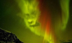 hedendom:  British photographer, Tom Mackie, captured this stunning image of the Aurora Borealis (the Northern Lights) while visiting Iceland.  Forming what looks to be a face, many locals suggested he had captured an image of a troll, vættir or perhaps