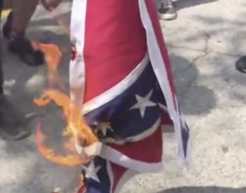 antifainternational:How it went for the Threepers and their other racist pals in Stone Mountain, GA. today: a photo essay.  It was hard to keep count, but we think like six confederate flags got burned today.  At one point, someone lit a confederate