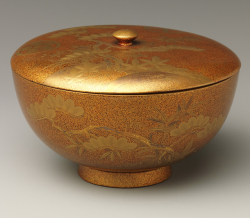 Covered Bowl with Design of Pine, Bamboo, and Cherry Blossom19th century JapanSprinkled gold on lacq