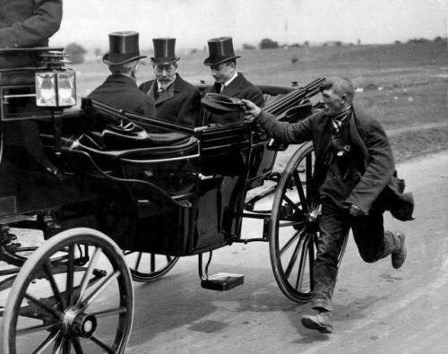 George V of the United Kingdom, trying to outrun a beggar.