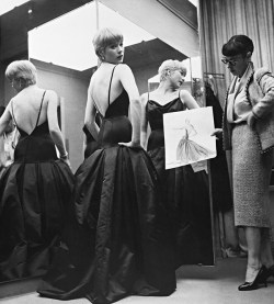 steroge:  Dressing for the Oscars, 1959   (Shirley MacLaine tries on the gown that she will wear to the Academy Awards ceremony, with renowned costume designer Edith Head holding a preliminary sketch of the dress)  