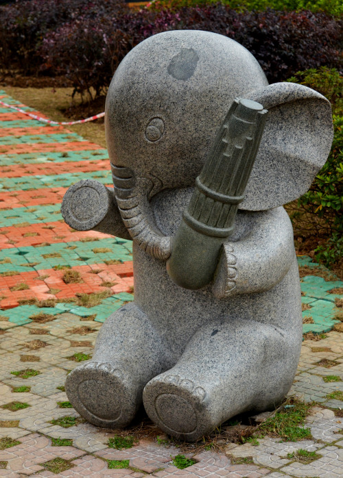 Statue of an elephant playing a Chinese instrument, located at Elephant Trunk Hill Park, Guilin, Chi