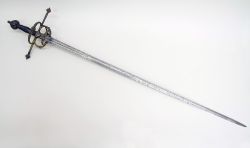 art-of-swords:  RapierDated: circa 1570Culture: ItalianMedium: steel, gold, iron, woodMeasurements: L. 47 5/8 in. (121 cm); W. 10 in. (25.4 cm); D. 5 in. (12.7 cm); Wt. 2 lb. 8 oz. (1133.98 g)Source: Copyright © 2015 The Metropolitan Museum of Art