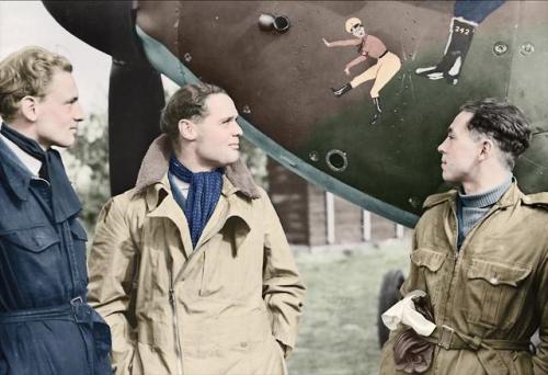 Douglas Bader (centre) inspects the nose of his Hawker Hurricane (Duxford, Cambridgeshire, October 1