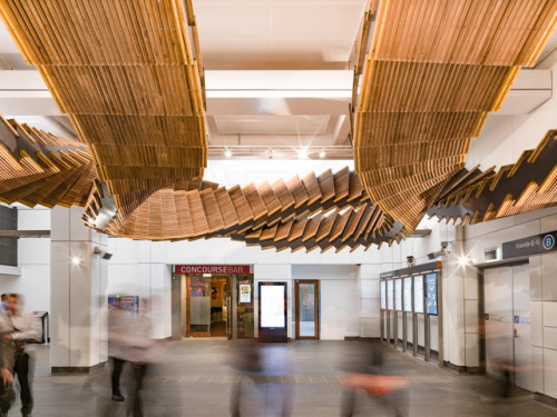 itscolossal: 80-Year-Old Wooden Escalators are Repurposed as a Sculptural Ribbon by Artist Chris Fox