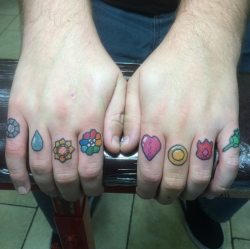 fuckyeahtattoos:  My Kanto pokemon badges. I fuckin love them. Picture taken moments after they were finished. Done by Shawn Havron at VB Ink in Virginia beach, VA. 