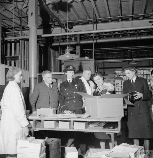 The manufacture of footwear for the Women&rsquo;s Royal Naval Service at afactory in the Midlands (E