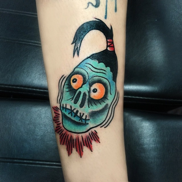 Shrunken head tattoo by @juliothemonster 🙌 (at Golden Daggers Tattoo Studio)