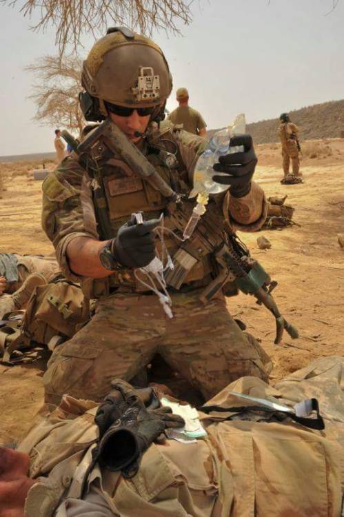 soldierporn: special-operations:Never look down on a medic, you never know when you will be looking 