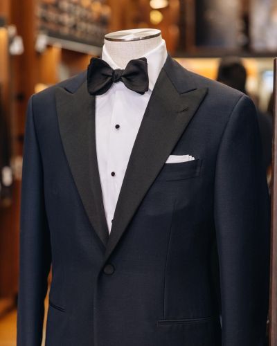 Introducing the Model 104 Tuxedo. Part of our Hundred Series, this garment is almost completely handmade with all production happening in the center of Italy. Made from a midnight blue wool/mohair blend from Dormeuil, a great weight for most...