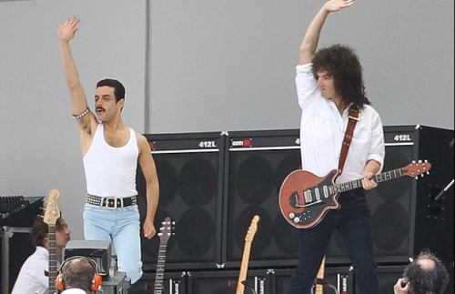 (via Watch Rami Malek perform as a perfect Freddie Mercury - The Strut) Watch a video of Rami Malek 