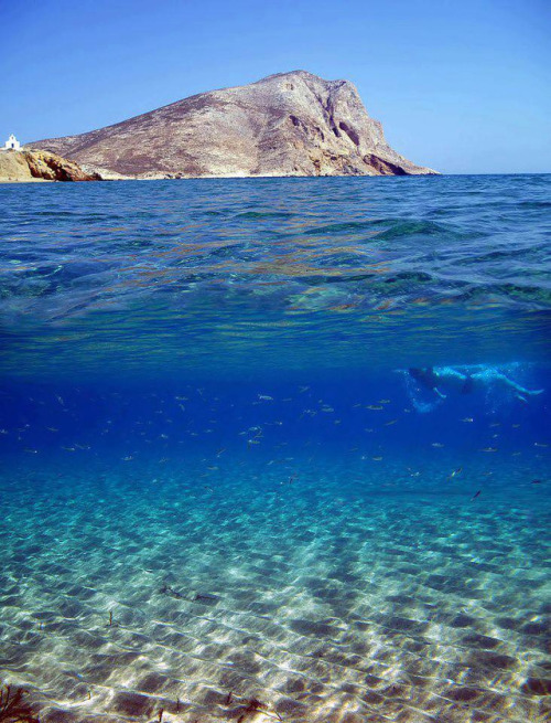Swimming among fish at Agioi Anargyroi, Anafi island, Greece.  