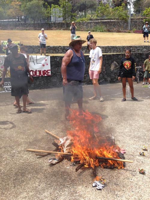 failsnail:  black-australia:  rooms-alone:  Aboriginal activists burn the Australian flag in an act of decolonization  Resist. Revive. Decolonize.   Burn some more please 