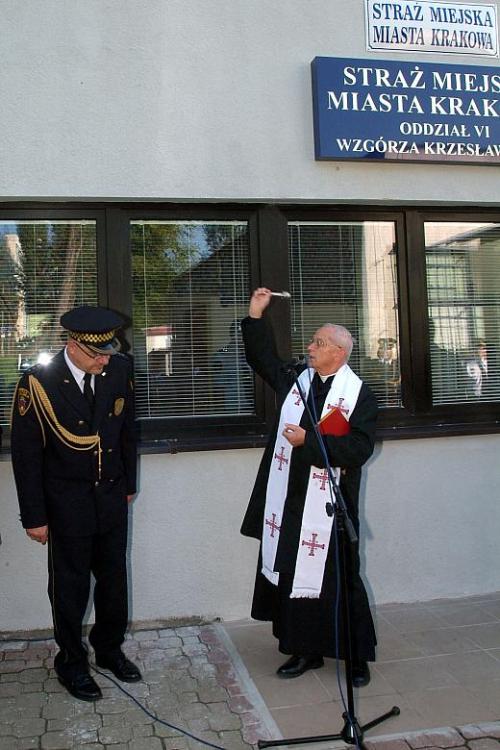 Polish priest blessing the new headquarters of the City Guard. 2007, Kraków.(Editor’s note: do