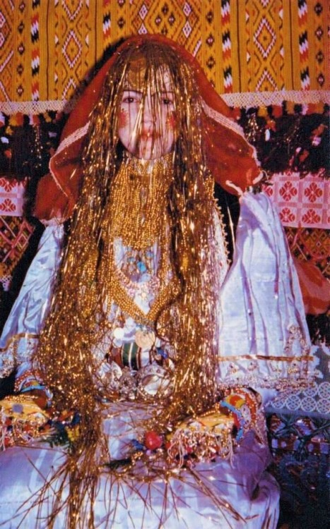 aloneandforsakenbyfateandbyman:A Gorani bride from Brod, Bosnia, 1956. Women help prepare the bride 