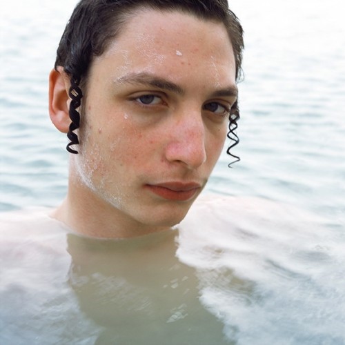 peachical:Young jewish man bathes in salt water by Benyamin Reich