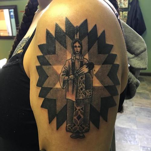Some real Native American tattoo action here, by Half Pint. No non-native woman wearing a headdress!