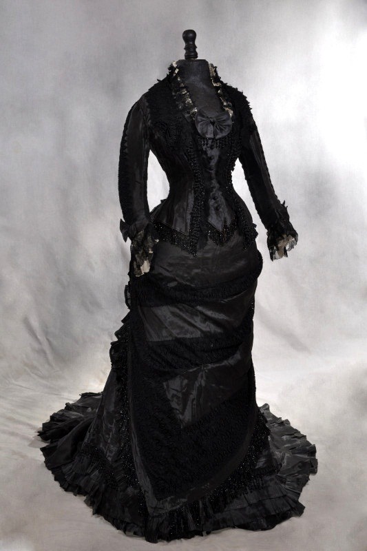 gothiccharmschool:  Oooh, this is lovely. Black lace dress from Mme Roger, 1878.