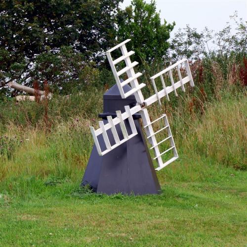 Just for Fun.An ornamental windmill in the garden of Beacon Windmill, Ravenscar, North Yorkshire, En