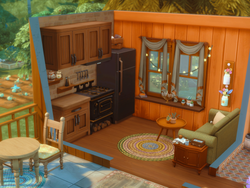 My sim&rsquo;s home. I&rsquo;m not a builder at all but I like it. Small cottage type of hom