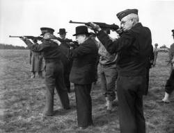 historicaltimes:  Dwight Eisenhower, Winston Churchill, and Omar Bradley firing M1 carbines, England, 1944 via reddit