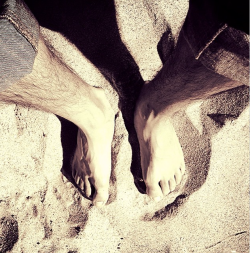 Feet and sand.