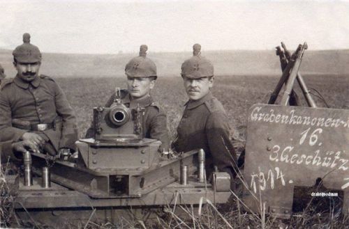 German Artillerymen with a 37mm Grabenkanone, a light artillery piece.