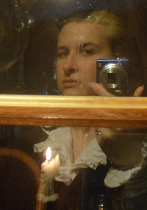 I tried to take some selfies in the China cabinet window.