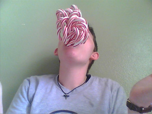 draggu:  draggu:  i wonder how many candy canes i can fit in my mouth   the answer is 19                         