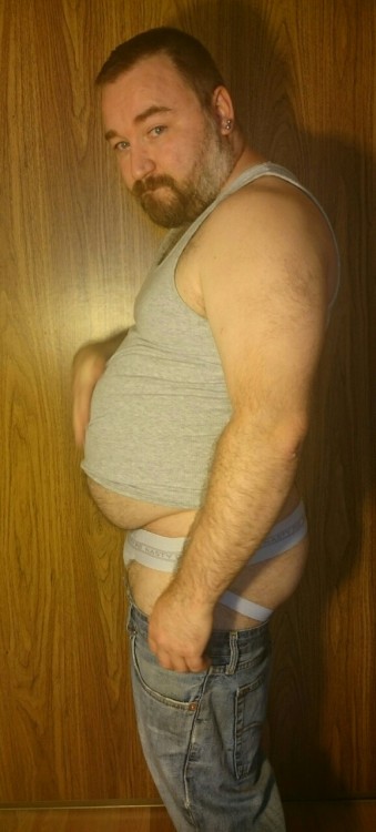 cuddlecubottawa:  I had a request for seeing me model in my favourite outfit. Somehow if was deleted but I took some pics anyways. This tank top is a bit tight around the belly, it makes me feel fat and I like that. These Jean shorts are probably the