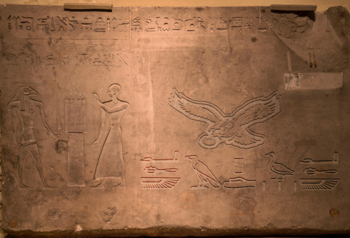 Any Egyptologists out there? We need a translation! Earlier today we noticed a mysterious inscriptio