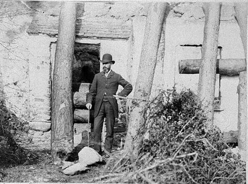Irish Land Waran Unidentified Man Stands At The Door Of His Home, Waiting For Eviction.