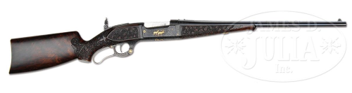 Extraordinary special order engraved and gold inlaid Savage Model 1899.  In unfired condition.Sold b