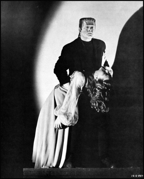 Lon Chaney, Jr. carries damsel Evelyn Ankers in Ghost of Frankenstein (1942)